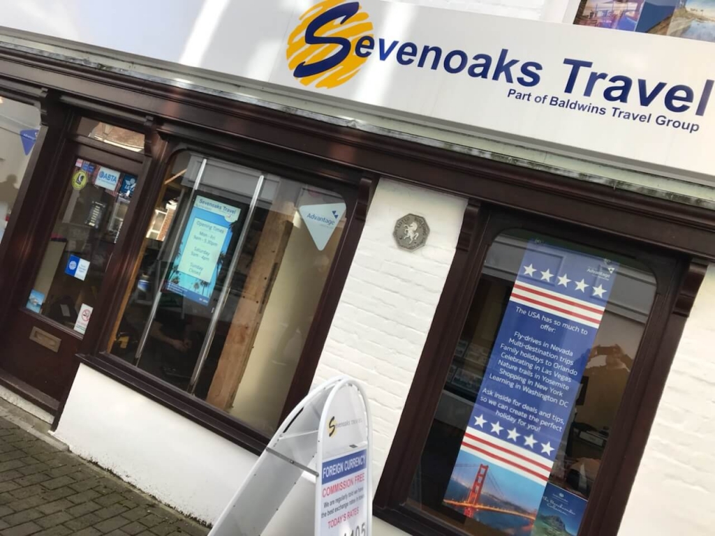 inVoke Digital Signage outward-facing advertising screen at Sevenoaks Travel