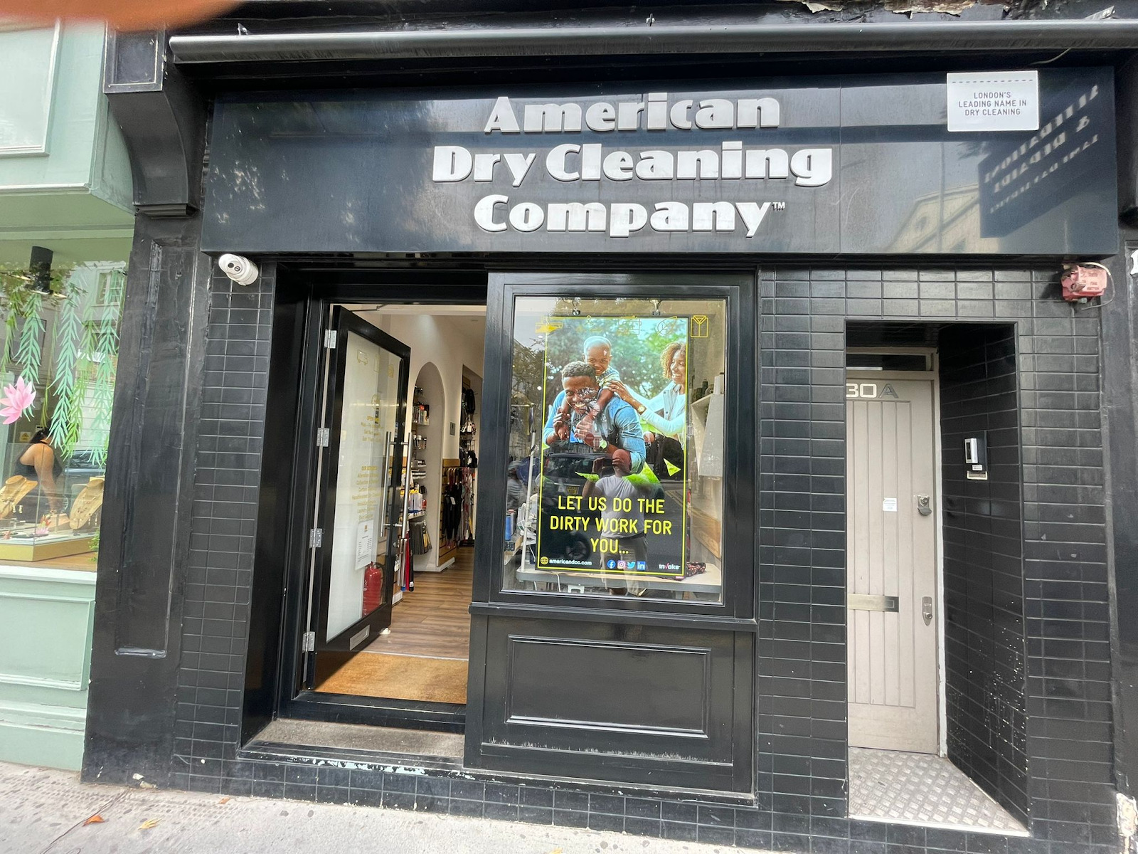 american dry cleaning company shop window screen