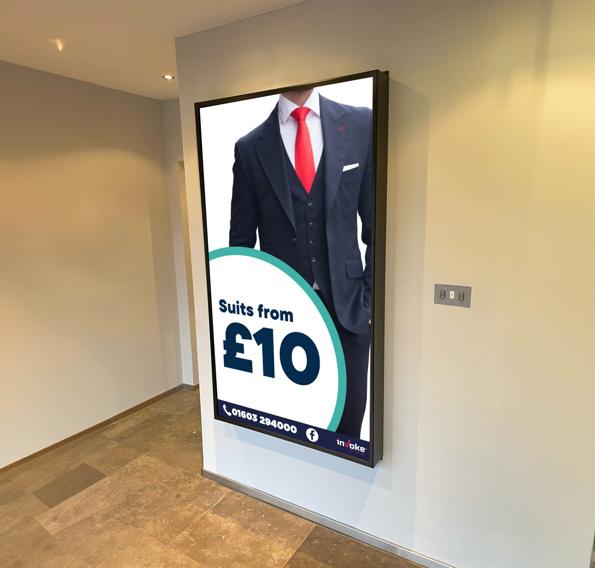 dry cleaners prices to clean suits advertised on internal screen