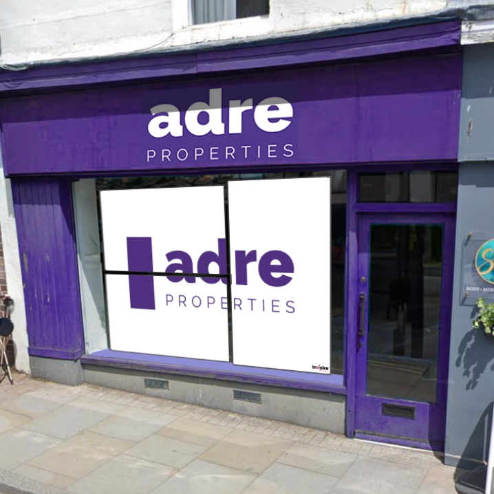 adre properties shop window board advertising who they are